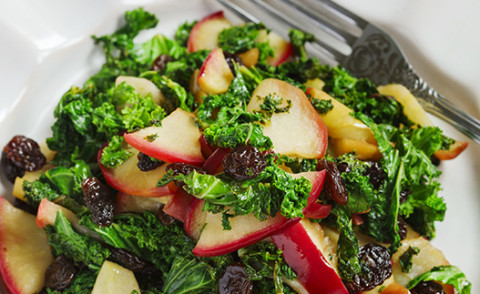 Spinach Salad with Apples and Raisins on a plate